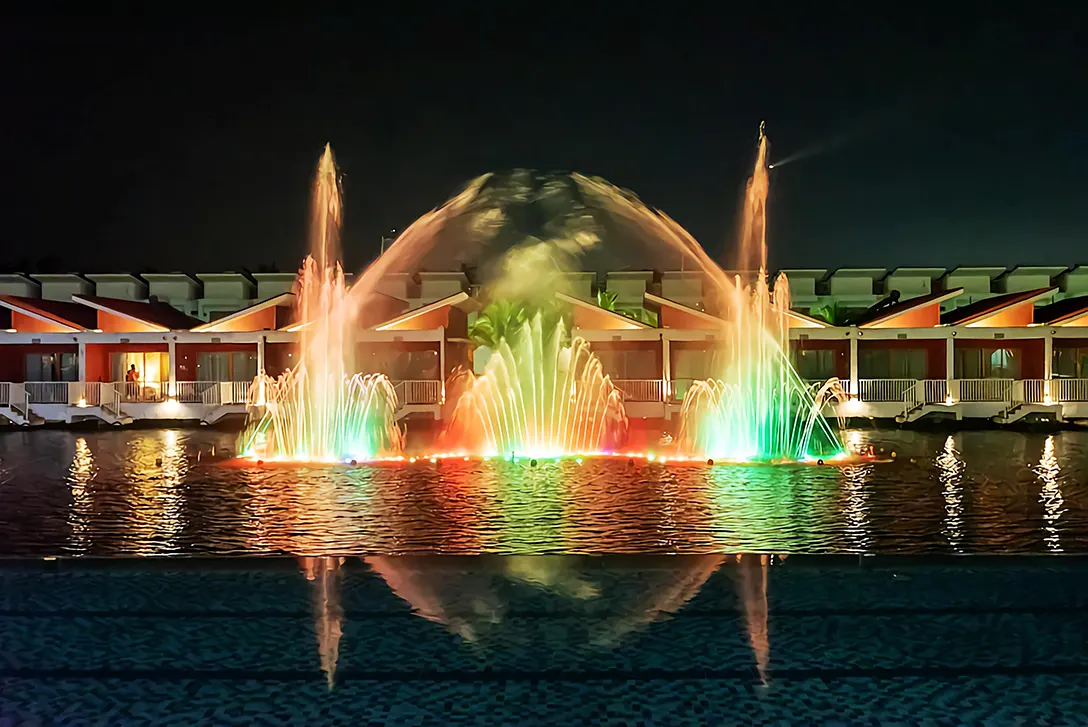 Eye-catching beautiful musical fountain illuminated with all the colors of the rainbow