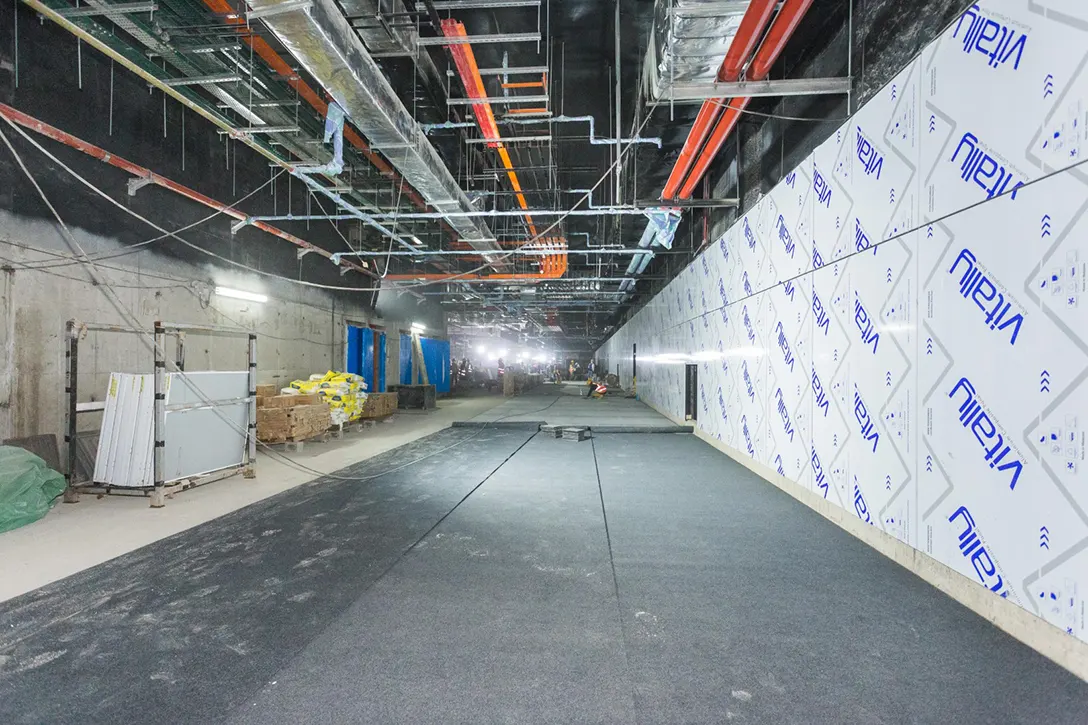 View of the Ampang Park MRT Station showing the cladding works at lower concourse level in progress.
