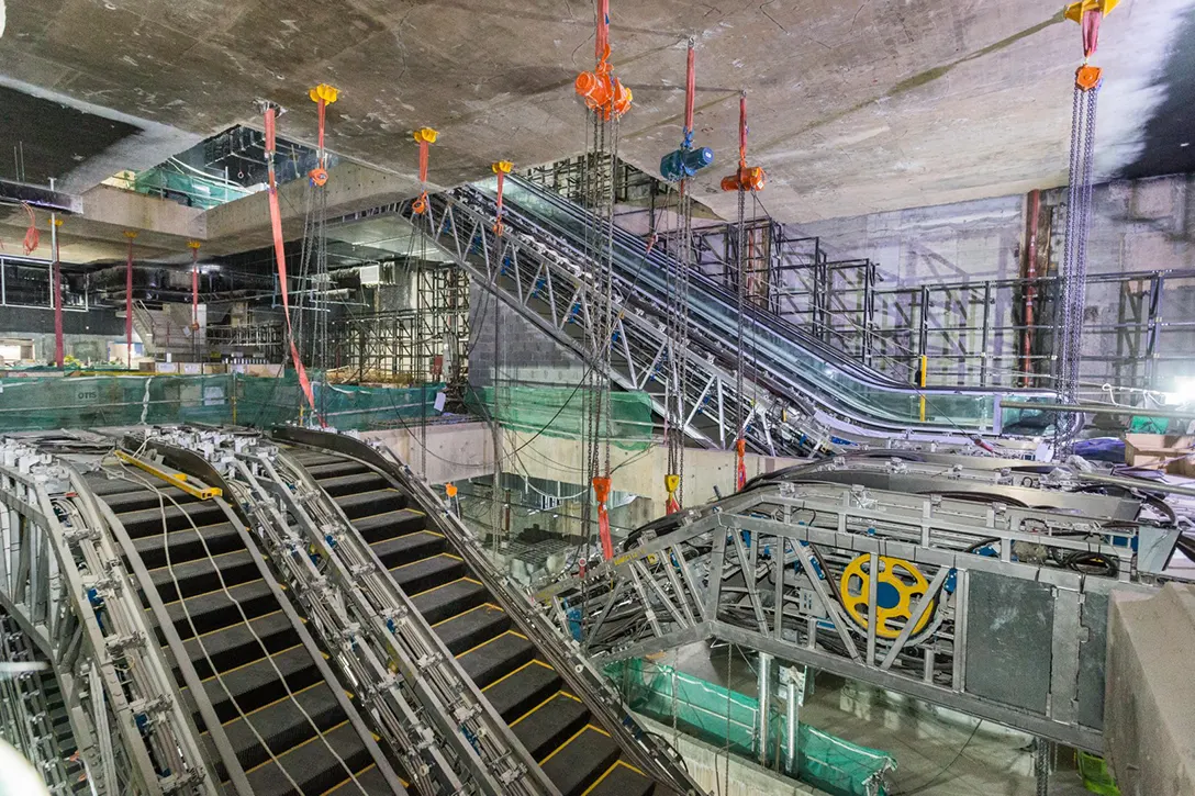 View of the Ampang Park MRT Station showing the escalator installation works in progress.