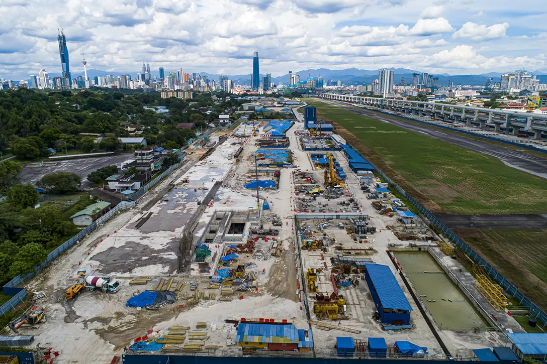 Aerial view of the Bandar Malaysia Selatan MRT Station showing the reinforced concrete works for platform and concourse level in progress.