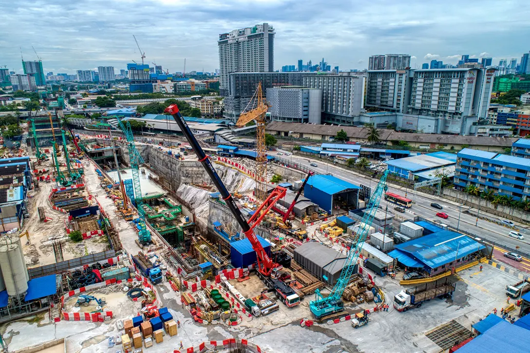 Aerial view of the Chan Sow Lin MRT Station showing the lifting works coordination between the station and tunnel team.