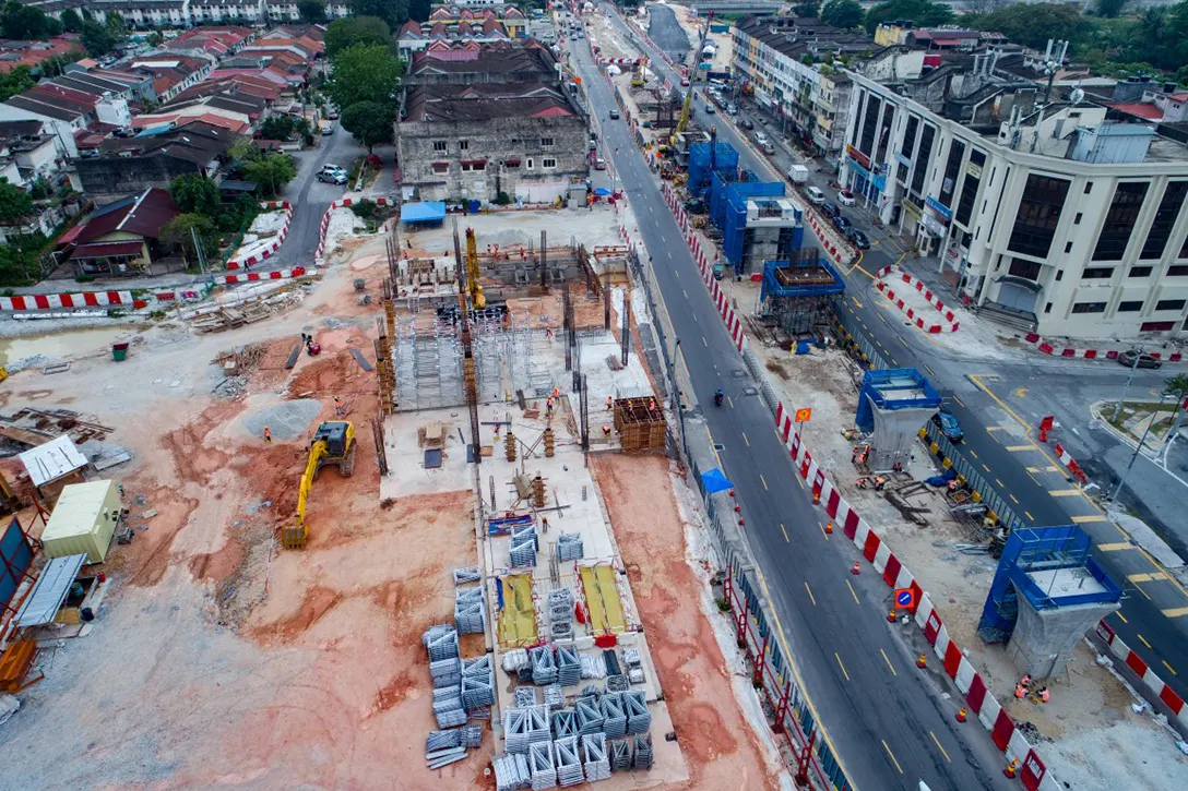 Column and ground level construction works taking place at the Kentonmen MRT Station North Entrance site