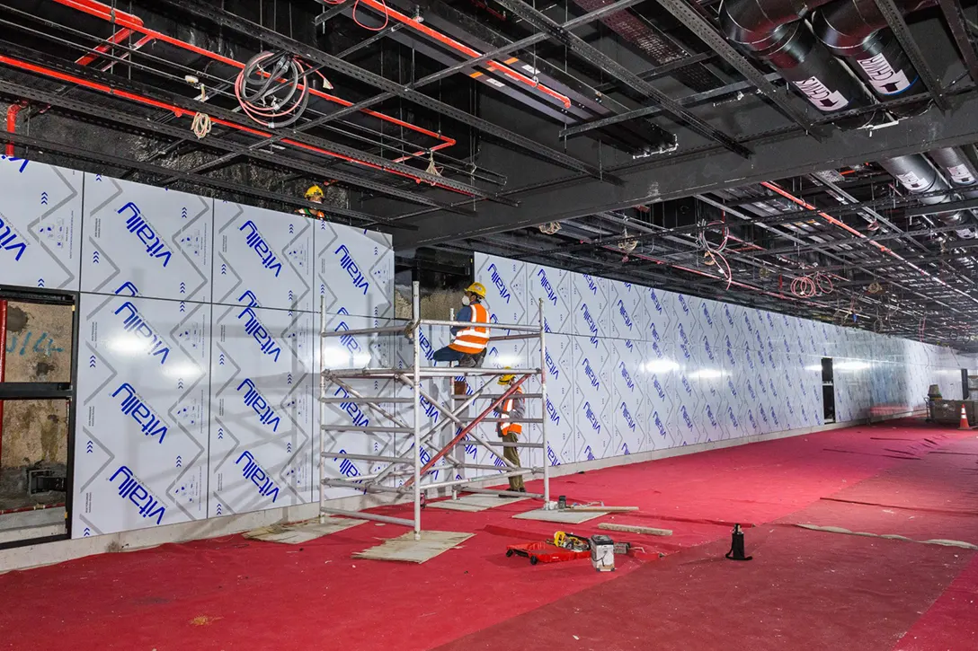 Cladding installation works at the Titiwangsa MRT Station concourse level.