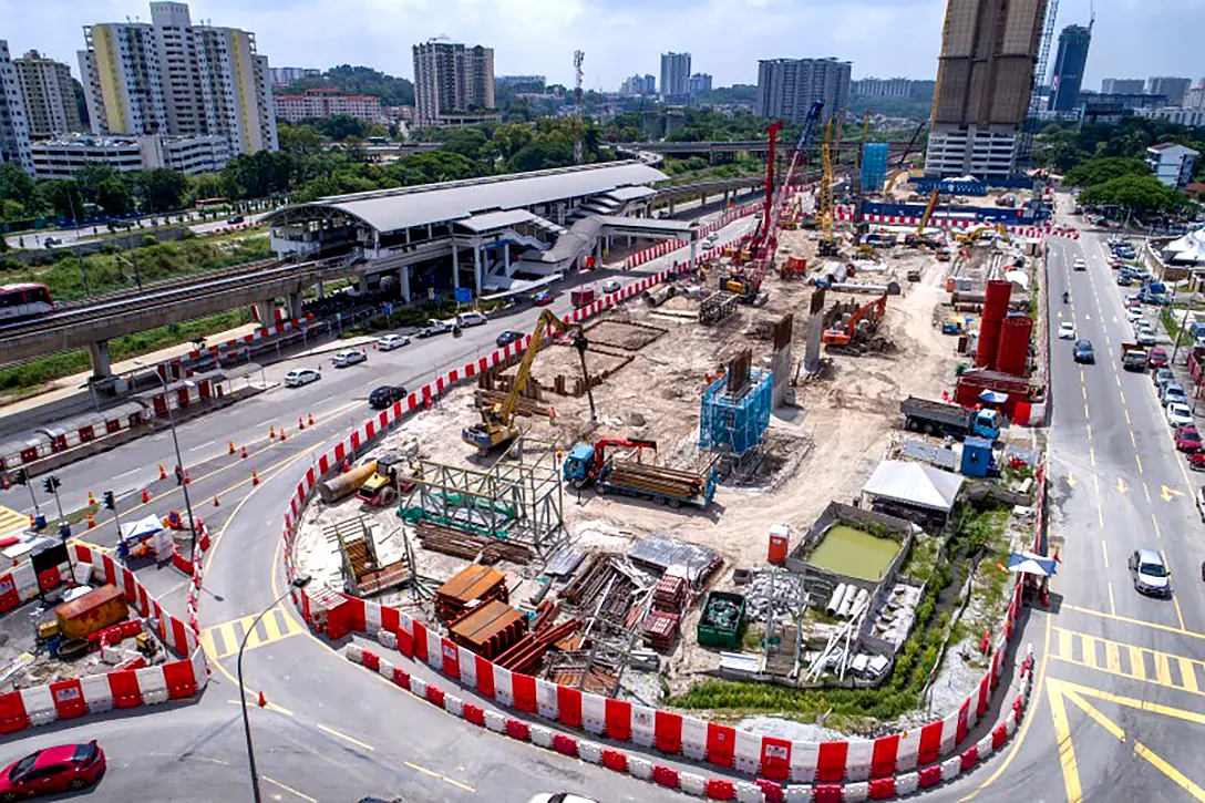Aerial view of shearwalls construction and sheet pile works at the Sungai Besi MRT Station site.
