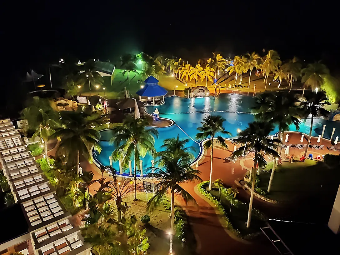 Night view of swimming pool at Thistle Port Dickson Resort