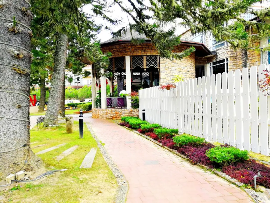 Relax and recharge at the lushy green environment at the Century Pines Resort