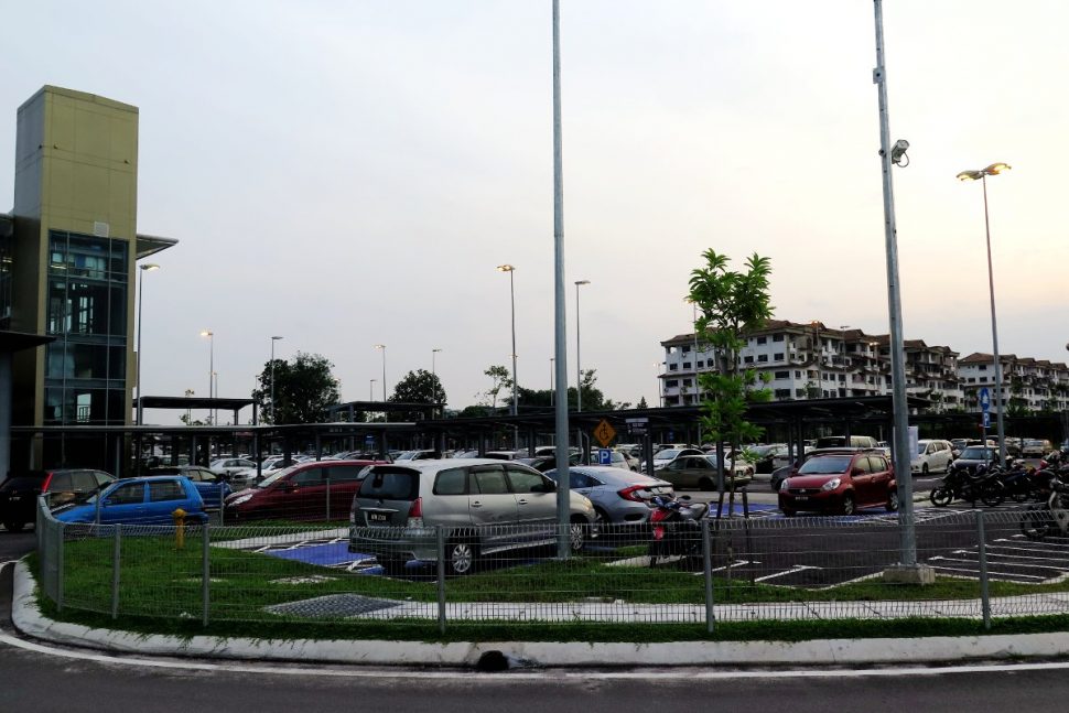 At-grade parking facility at the station