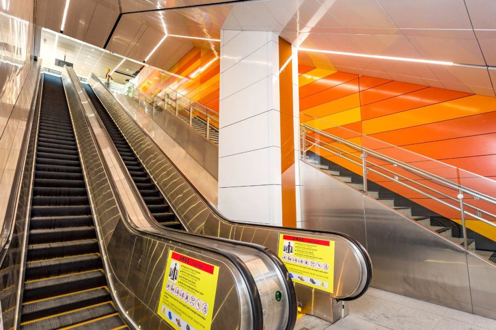 Escalator and stair access between levels at Cohrane station