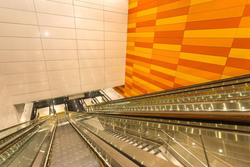 Escalator and stair access between levels at Cohrane station