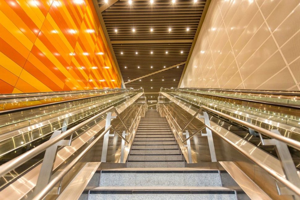 Escalator and stair access between levels at Cohrane station