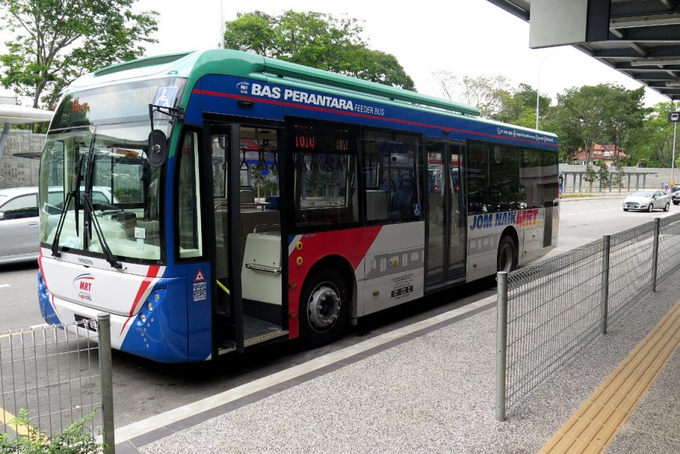 MRT feeder bus waiting at bus stop near Entrance B