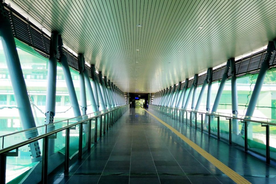 The pedestrian link bridge heading out of the Phileo Damansara Station.