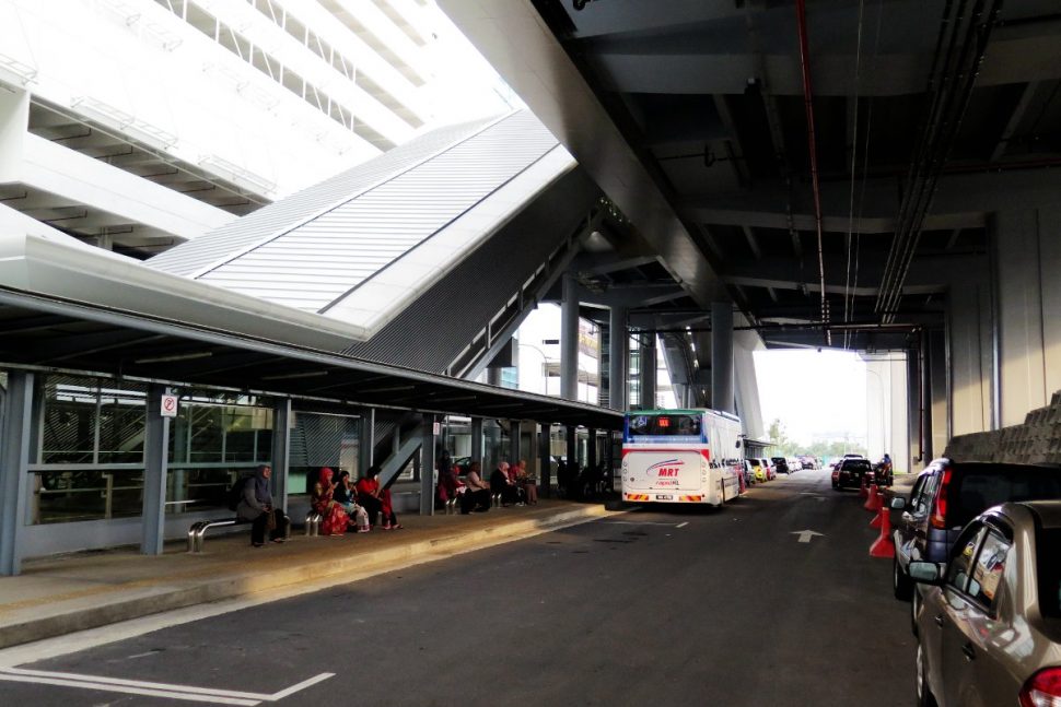 Feeder bus waiting near entrance A of station