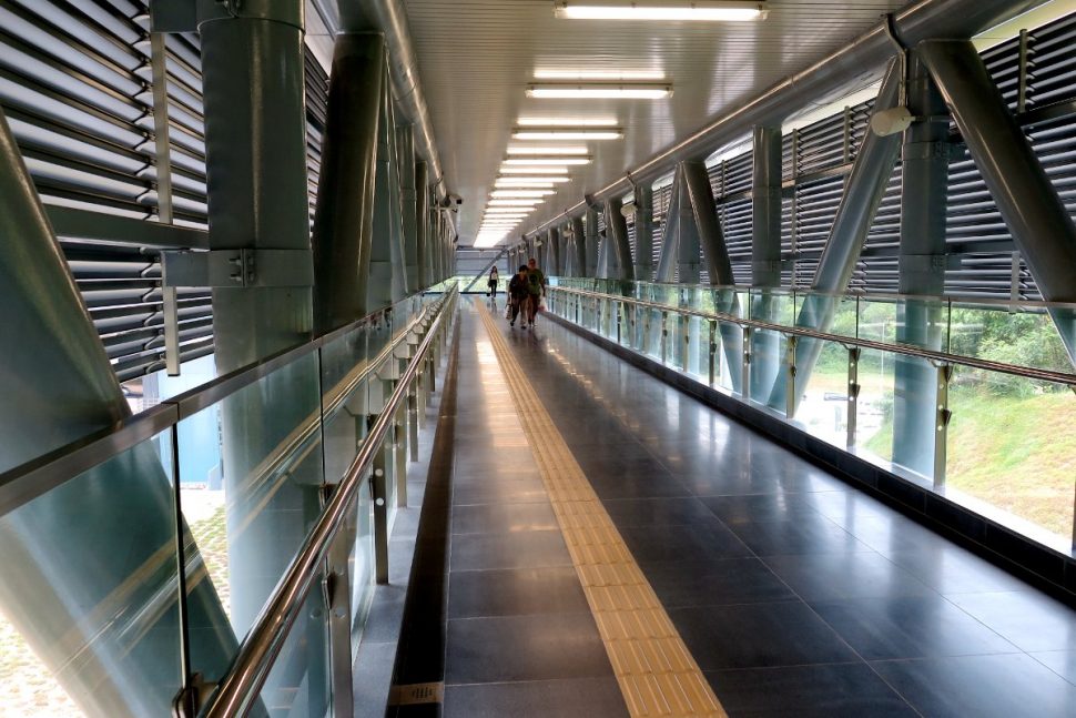 Long pedestrian walk to entrance C