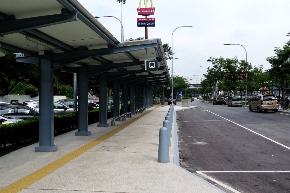 McDonald's and bus waiting area near entrance B