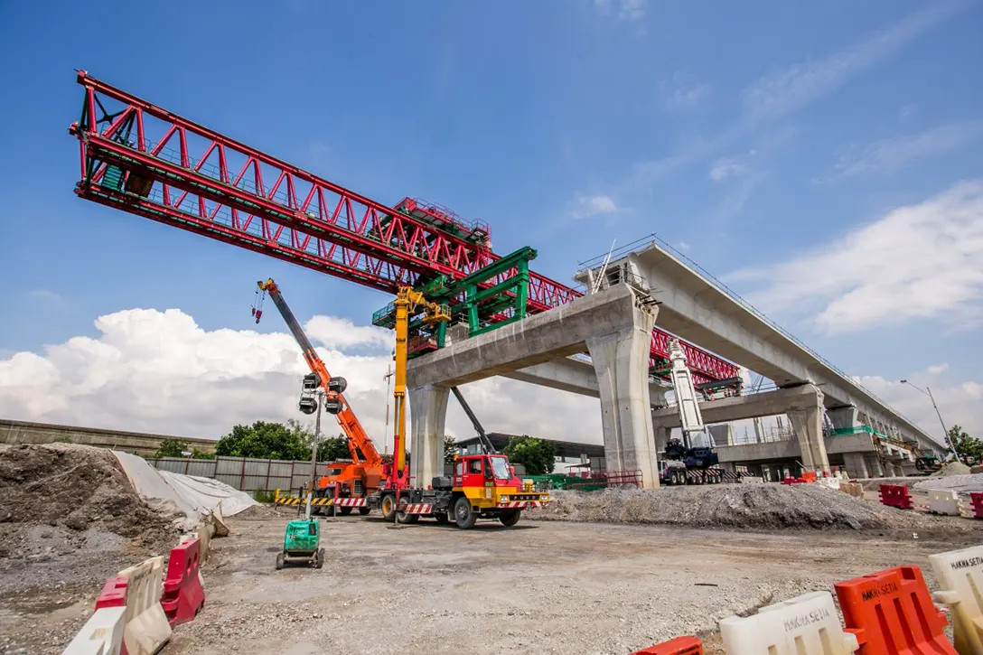 Segmental Box Girder launching in progress at the Putrajaya Sentral MRT Station site.