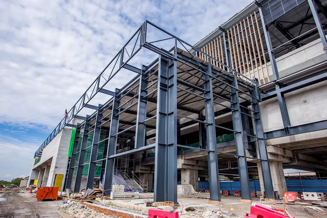 Overall view of Putrajaya Sentral MRT Station entrance steel structure works in progress.