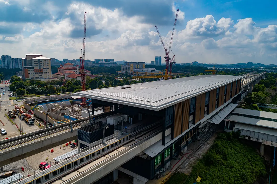 Aerial view of the Putrajaya Sentral MRT Station showing the defect works and external turfing works in progress.