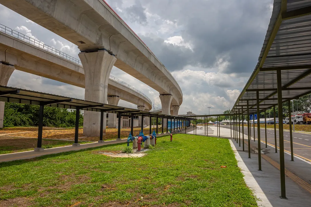 Yellow tiles works along the benches at the covered walkway in progress at the Putrajaya Sentral MRT Station.