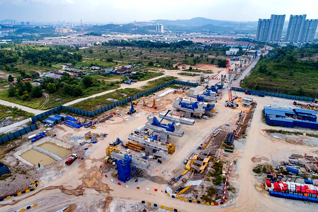 Aerial view of installation of T-shape piers and micropiling works at the 16 Sierra MRT Station site.