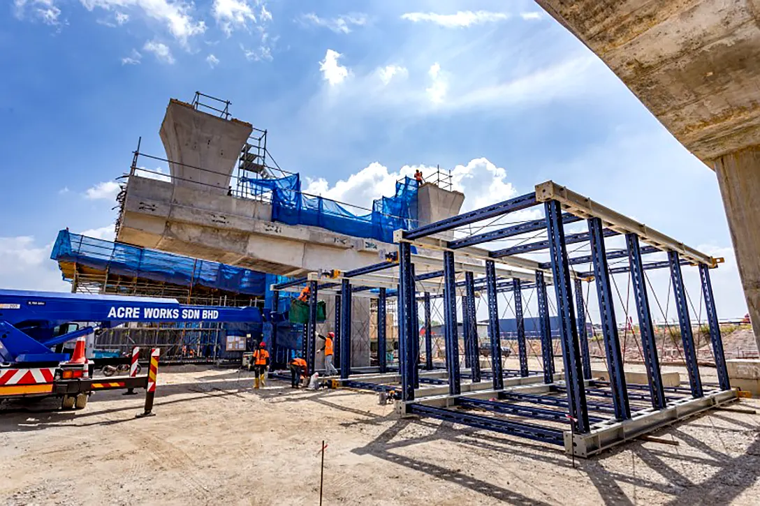 Trestle tower assembly works for the T-beam launching for the 16 Sierra MRT Station concourse level.