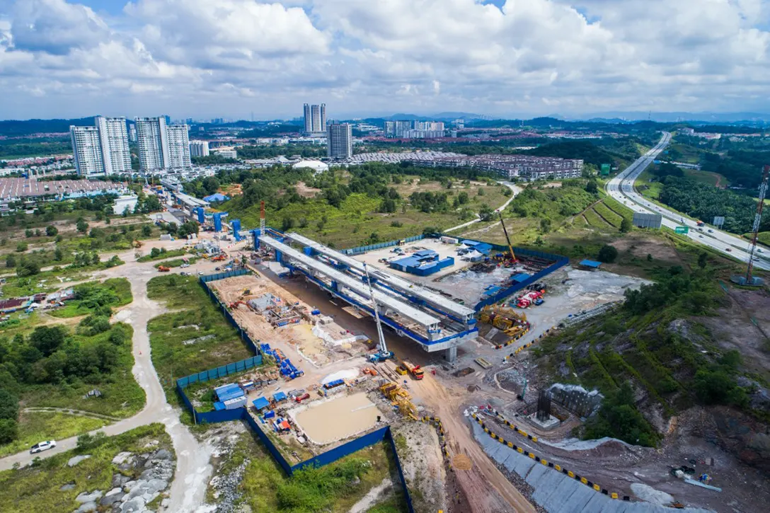 Aerial view of segmental box girder launching works at the 16 Sierra MRT Station site.