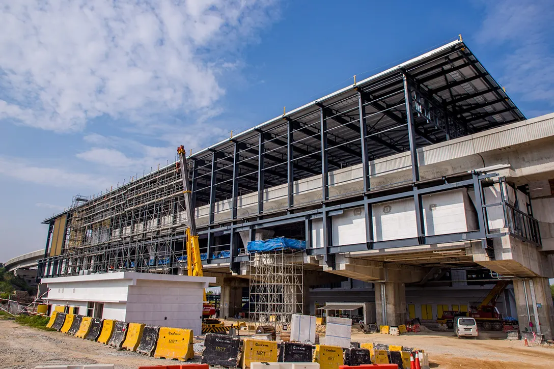 External trellis façade installation in progress at the 16 Sierra MRT Station site.