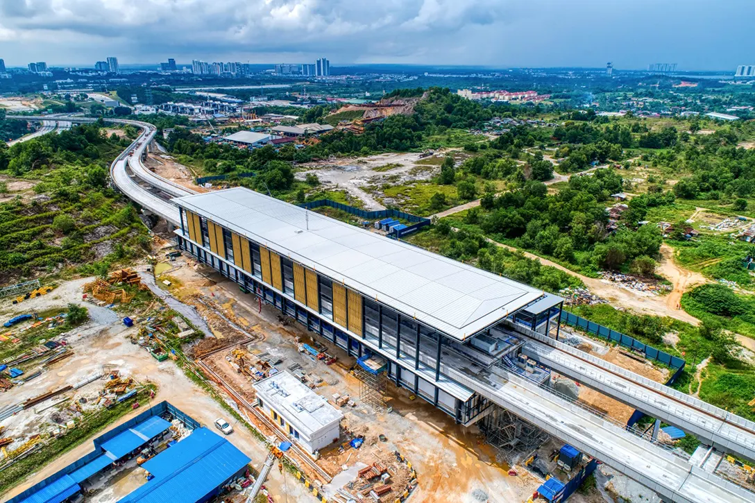 External façade trellis installation in progress at the 16 Sierra MRT Station.