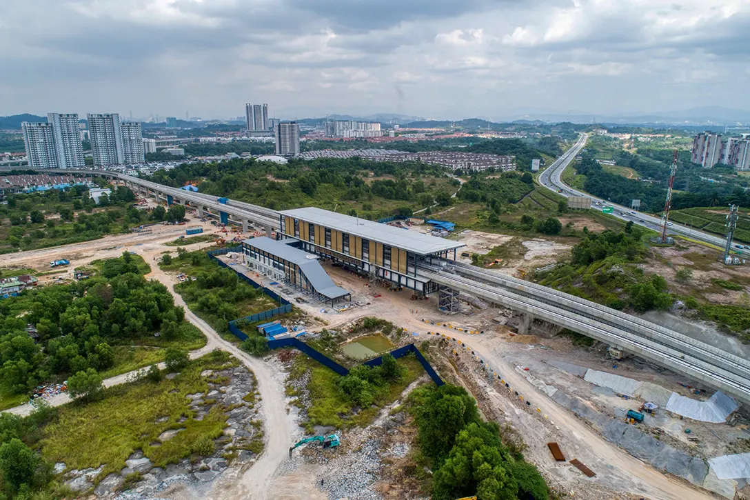 Aerial view of the 16 Sierra MRT Station showing station box external façade and mesh installation in progress