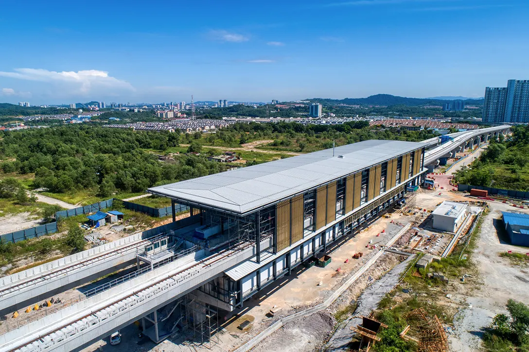Aerial view of the 16 Sierra MRT Station showing the external façade works in progress.