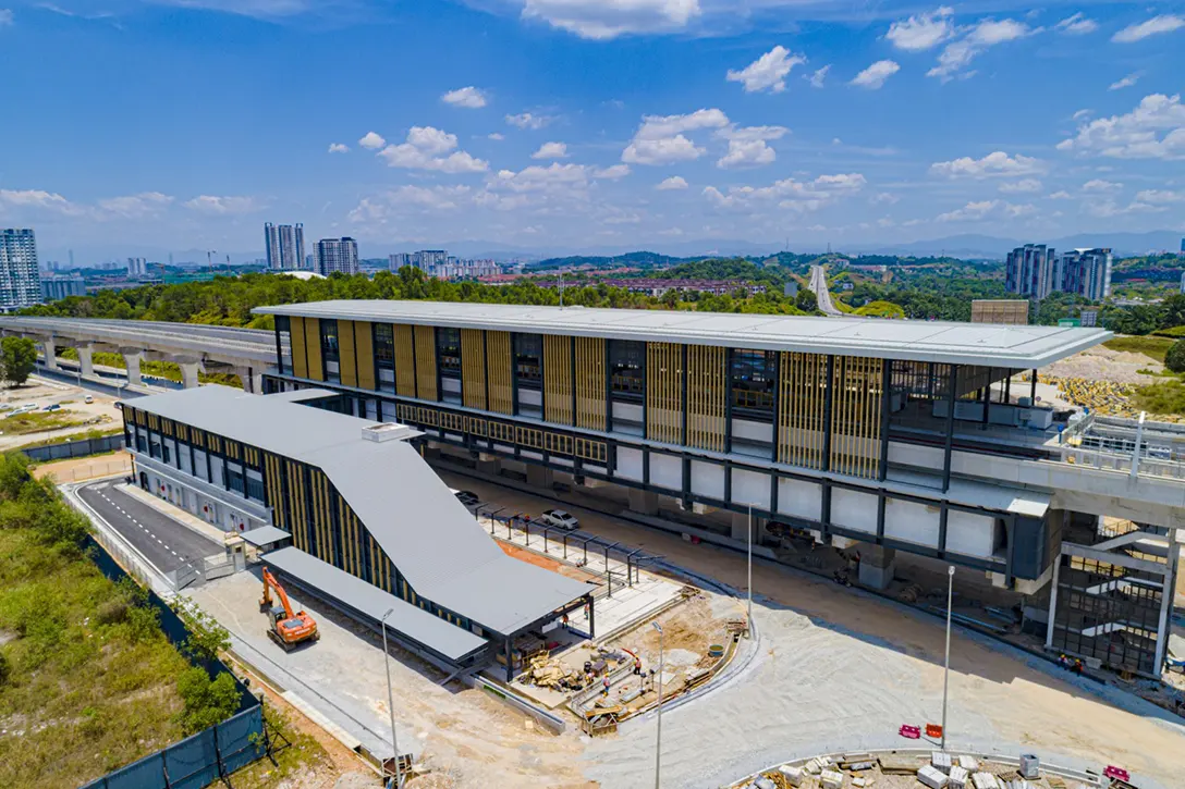 Aerial view of the 16 Sierra MRT Station showing the station external works, Entrance 2 works, drainage, roadwork and covered walkway in progress.