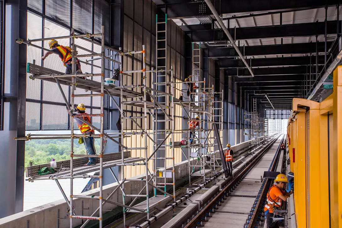 View of the 16 Sierra MRT Station platform showing the additional rain splash barrier installation in progress.