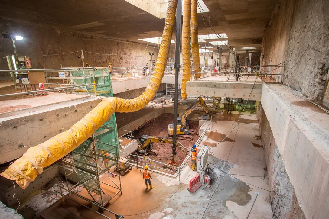 Plant room excavation activities using telescopic arms in progress at the Ampang Park MRT Station site.