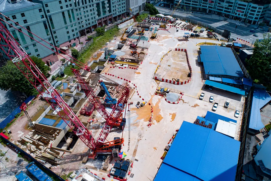 Aerial view of the Ampang Park MRT Station site showing 67% completion.