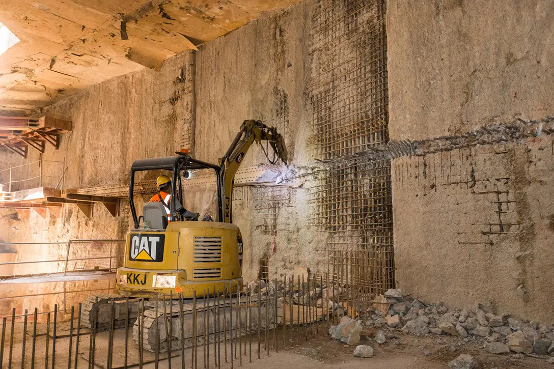 Hacking of diaphragm wall to begin internal reinforced concrete wall construction at the Ampang Park MRT Station site.