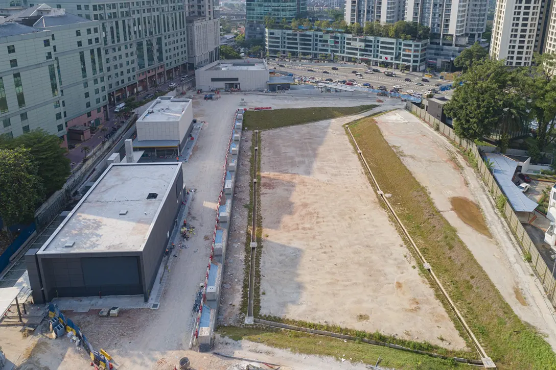 Aerial view of the Ampang Park MRT Station showing its entrances and ventilation building.