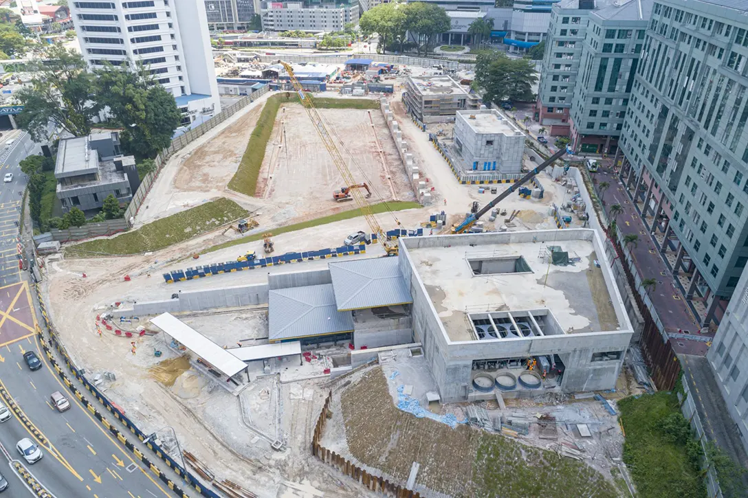 Aerial view of the Ampang Park MRT Station showing the progress of entrance and ventilation building structures.