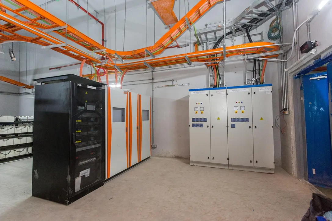 View of the Bandar Malaysia Selatan MRT Station showing the installation of uninterruptible power supply (UPS) module in progress at the concourse level UPS room.