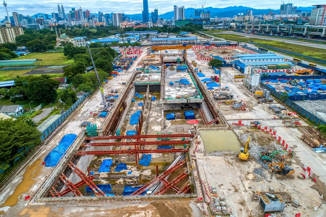 Aerial view of the ongoing construction progress of roof slab, reinforced wall, columns, backfilling works, laying of water proofing and dismantling of strutting at the Bandar Malaysia Utara MRT Station