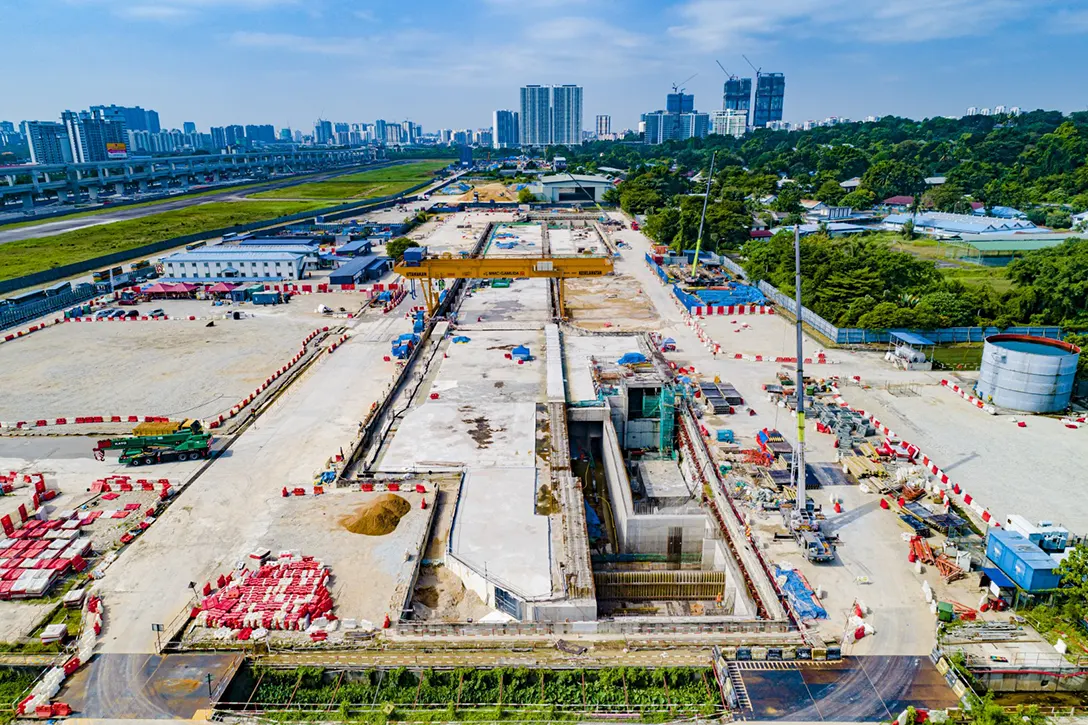 Aerial view of the Bandar Malaysia Utara MRT Station showing construction progress of roof slab, column, internal wall, backfilling works and laying of water proofing.