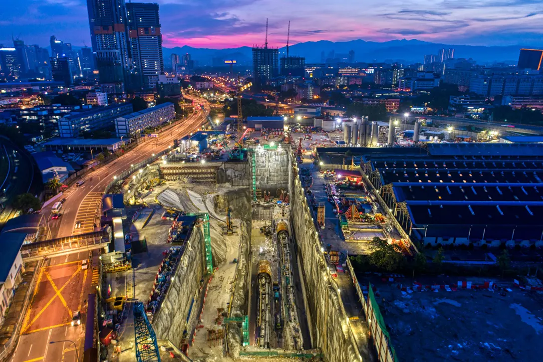 Aerial view of the Chan Sow Lin MRT Station site at night.