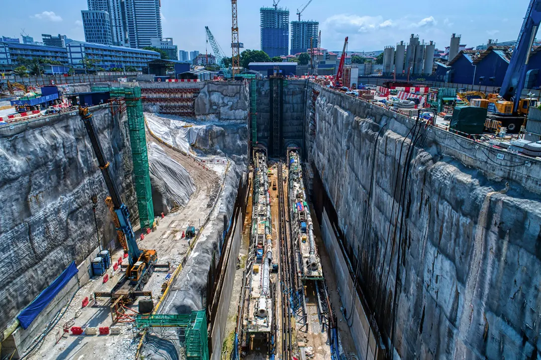 Aerial view of the Chan Sow Lin MRT Station site showing the tunnel boring machine launching works in progress.