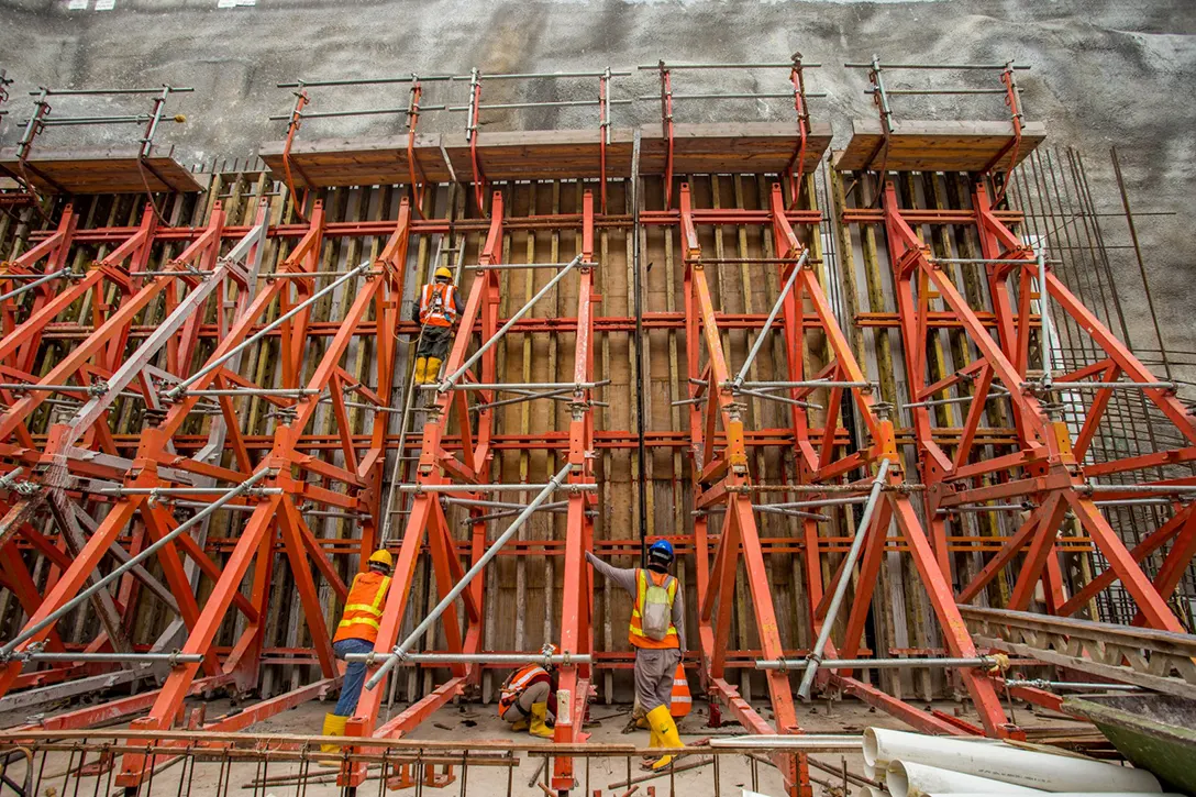 Ongoing external wall formwork installation at the Chan Sow Lin MRT Station site.