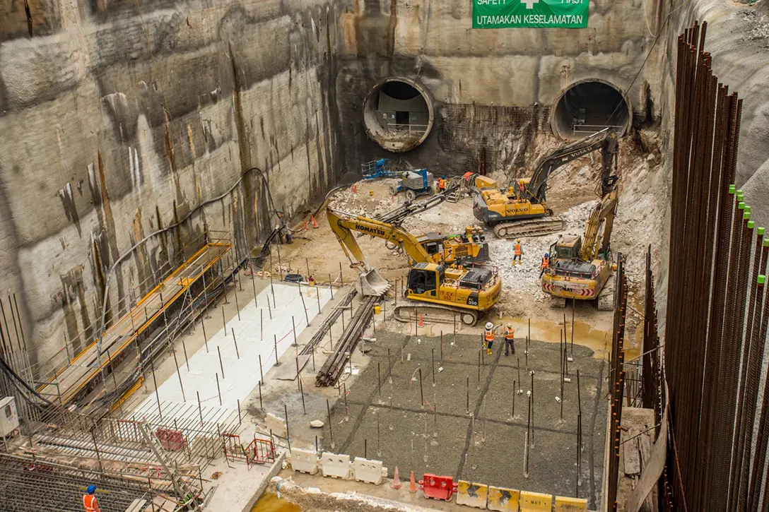 Ongoing final stage of excavation and construction of base slab at the Chan Sow Lin MRT Station site.