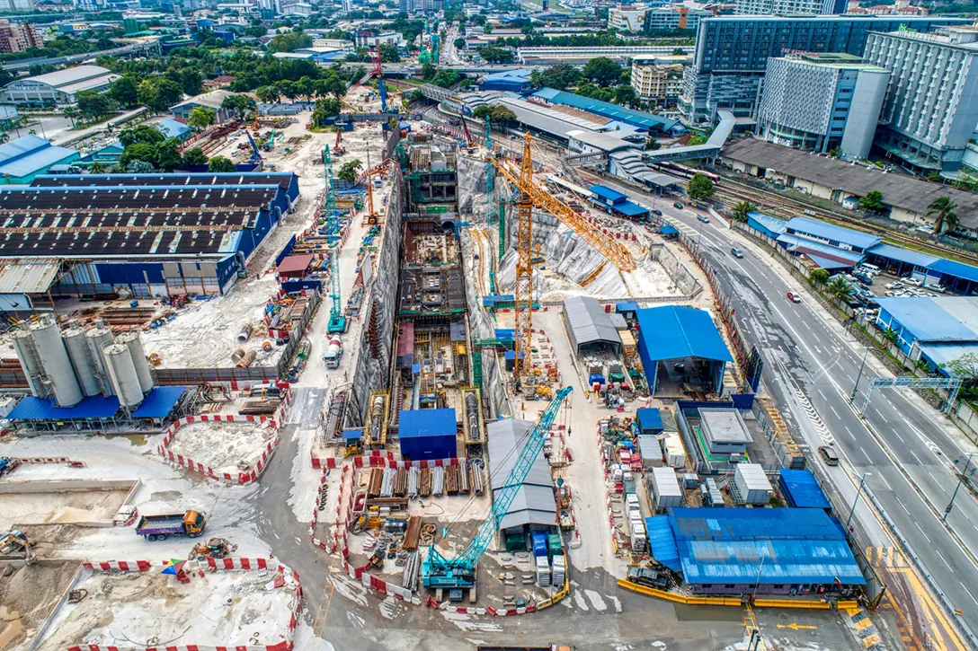 Overall view of Chan Sow Lin MRT Station site with progress at 66%.