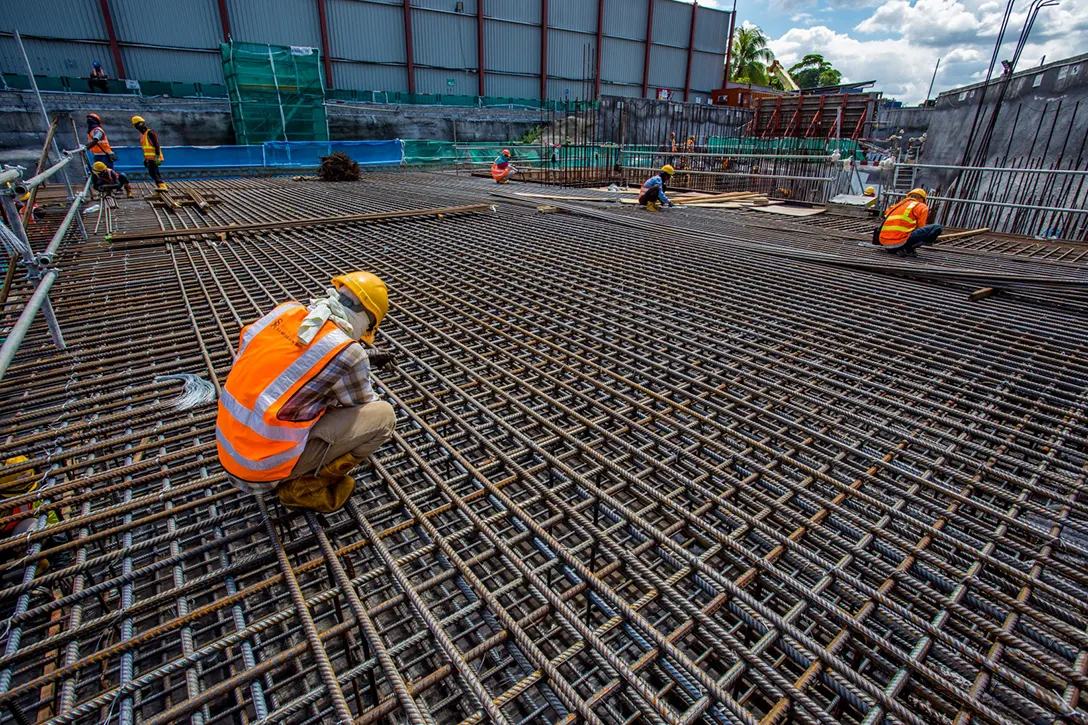 Rebar fixing in progress for Entrance B roof slab at the Chan Sow Lin MRT Station site.