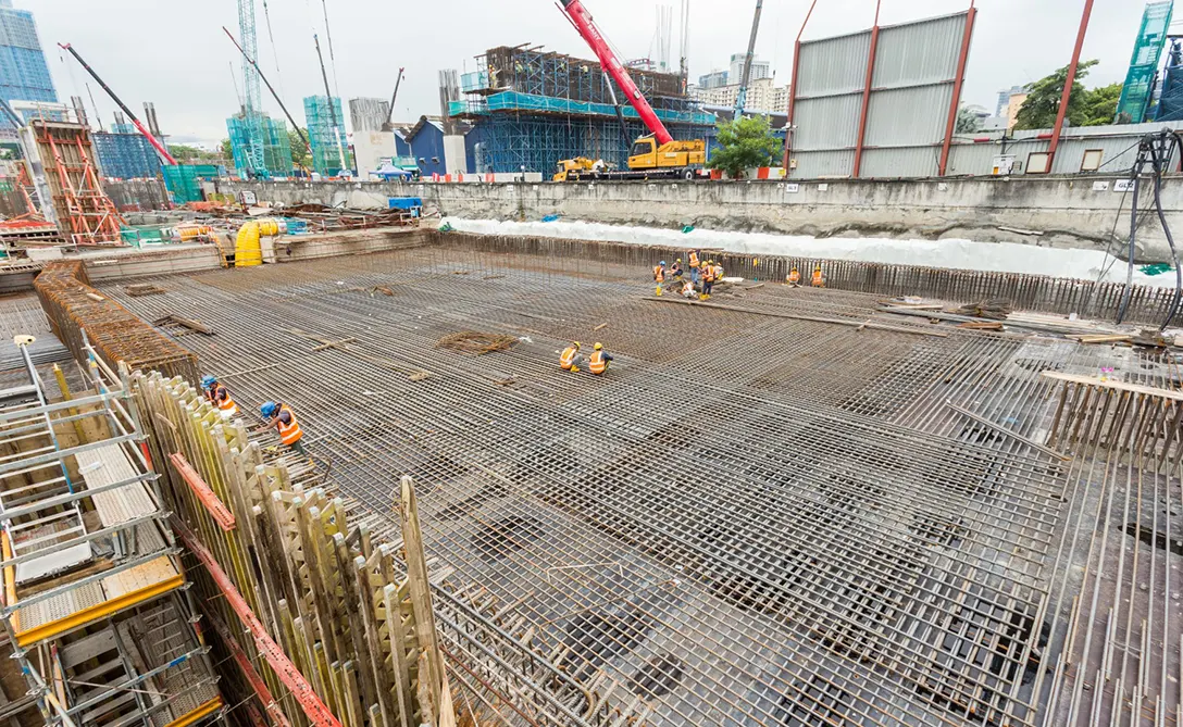 Installation of steel reinforcement bars for roof slab casting in progress at the Chan Sow Lin MRT Station.