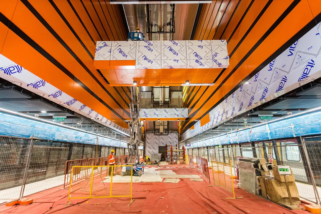Installation of cladding in progress at the platform level of the Chan Sow Lin MRT Station