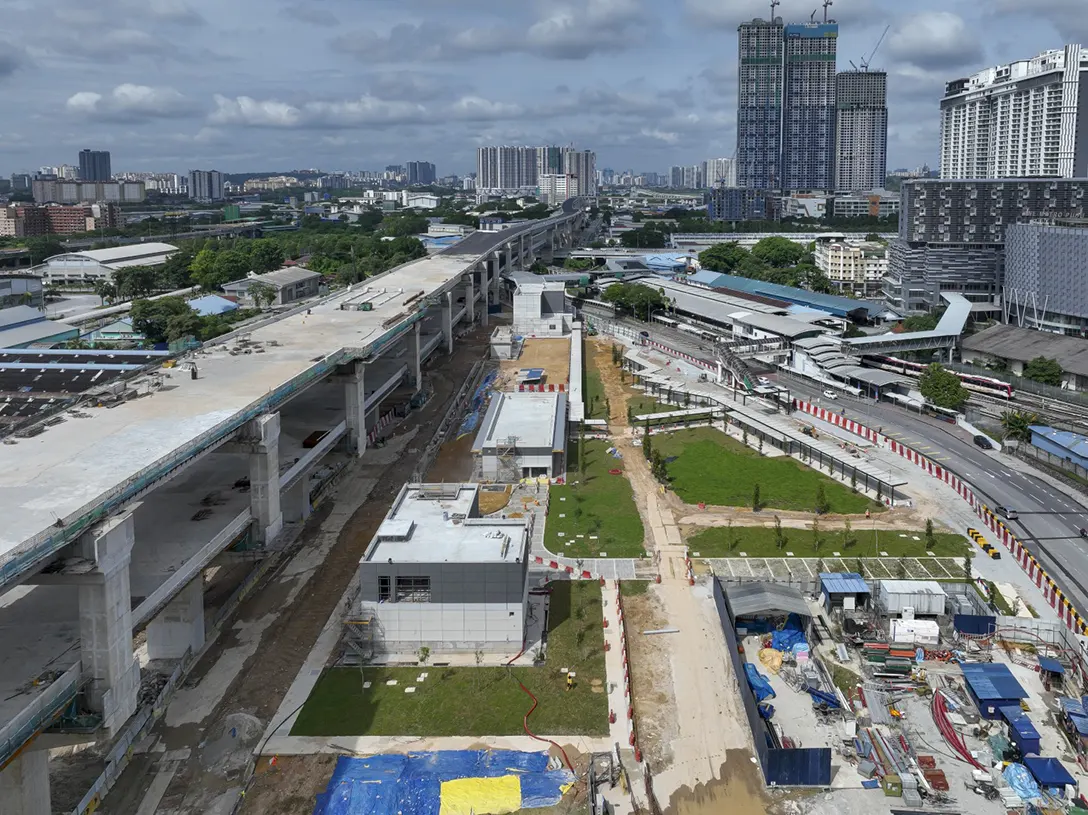 View of the nearly completed concourse level and escalator 1 & 2 of the Chan Sow Lin MRT Station.