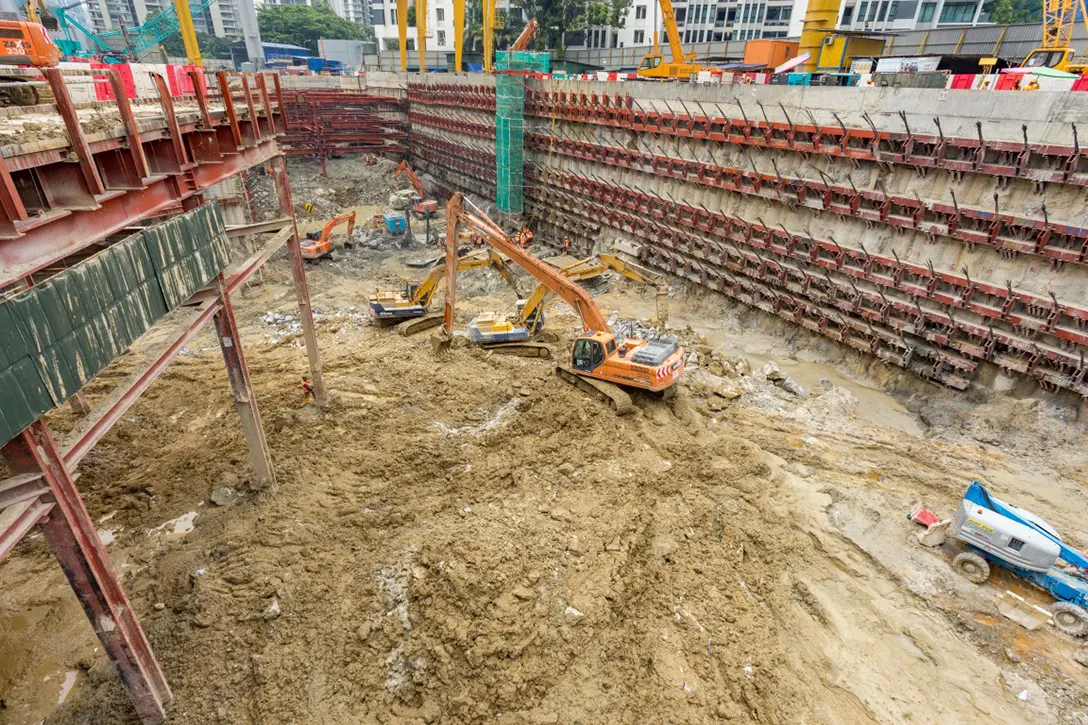 Major excavation and soil muck removal works at the Conlay MRT Station site.